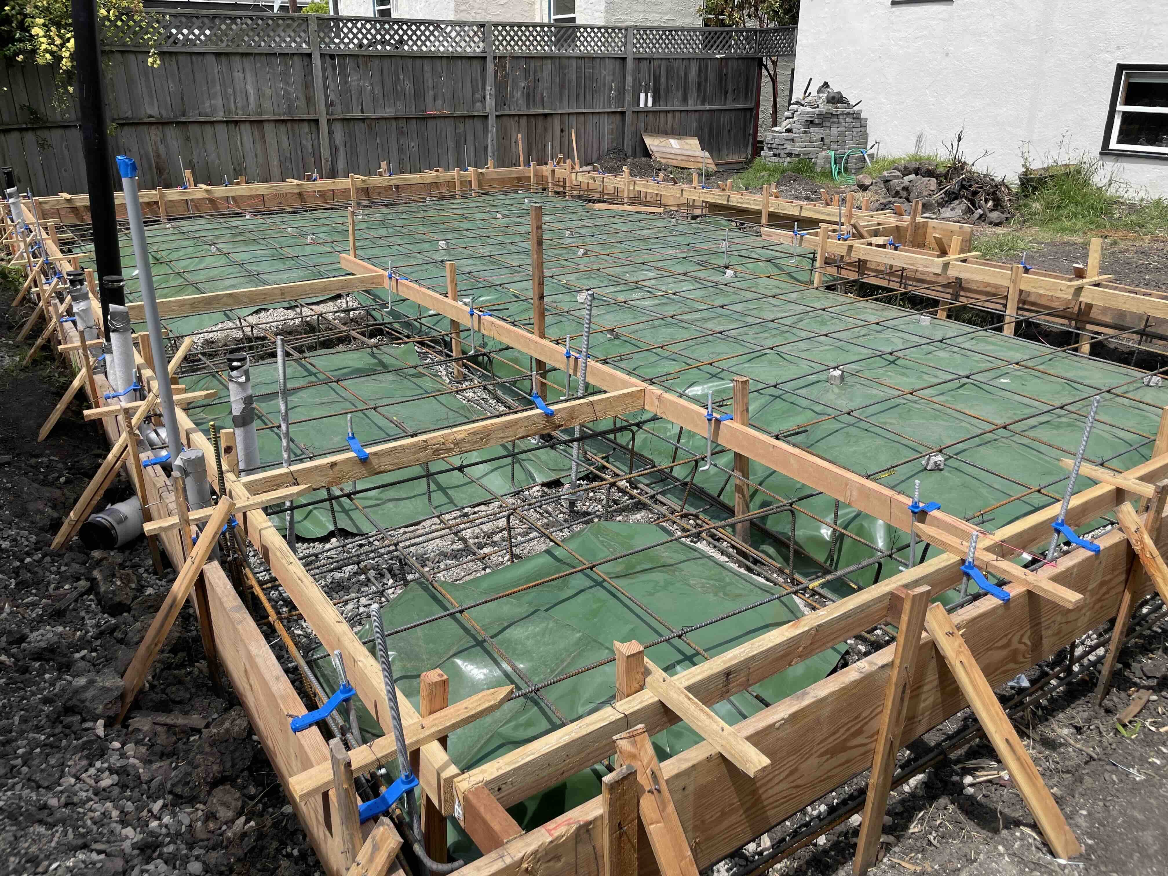 Concrete foundation slab with reinforcing steel
